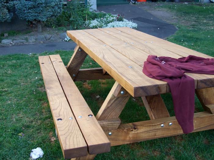 Fraternity receives table built from fallen tree