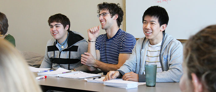 The president of Campus Climate Challenge, Gary Wang 11, works with Wayne Lichty 11, Bailey Arend 10, and the rest of the club to plan the National Teach-In that is being held this week on campus. Photo credit: Peter Zipparo
