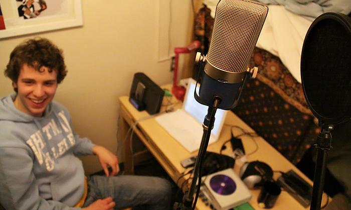Alex Folkerth, â€˜12, has turned his Anderson Hall room into a makeshift recording studio. Photo credit: Peter Zipparo