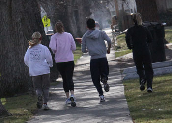 A group of runners jog together in Walla Walla. Heather Hakes started a jogging club in Walla Walla to offer support for joggers, making it easier to sustain a pace. Credit: Klein