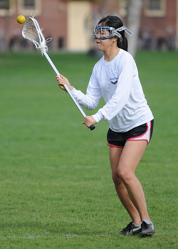 Kie Watanabe, â€˜12, is one of a large class of first-year womens lacrosse players. Before lacrosse moved West as a sport, first-years would often not be very experienced, but almost everyone in this class had played before. Credit: Jacobson