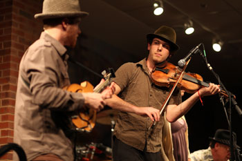 Matthew â€˜Ranger Sciacca, â€˜09, and mandolinist Dave Stewart on stage at Coffeehouse last Friday, April 17. Credit: Norman