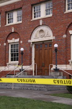 Caution tape blocks students and faculty from entering the building. Credit: Zipparo.