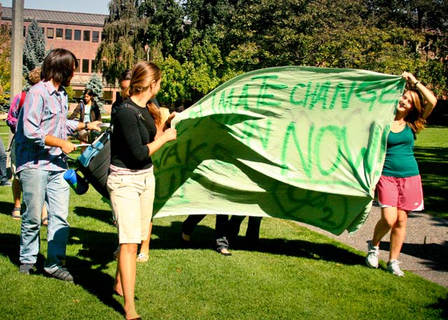 Campus Climate Challenge activists fight for change during a campus-wide march. Credit: Hong