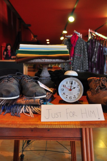 A display in Studio Opal displaying their merchandise, focuse on men's wear