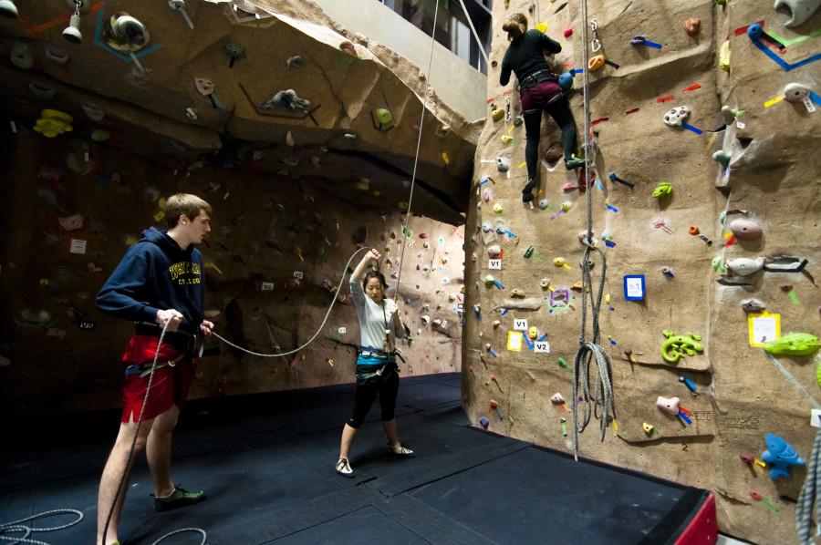 Ahren Stroming â€˜14, Isabel Hong â€˜11 and Chelsea Cordell â€˜14 take advantage of Whitmans exceptional climbing center, practicing belaying technique in a beginning climbing class. Credit: Marin Axtell