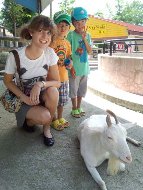 The boys were a little scared of the goats.