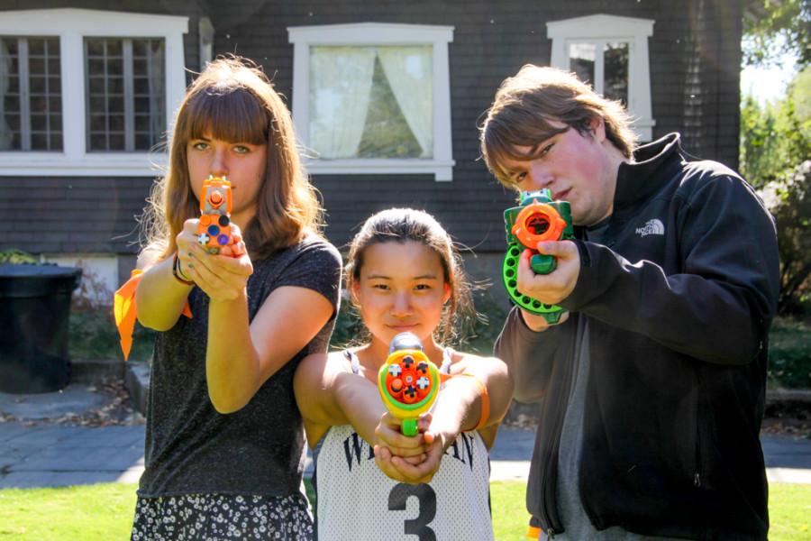 Bari Scott '18, Hyun-Soo Seo '18, and Nick Moen '16 are ready for the zombie apocalypse. Photo by Rachael Barton.