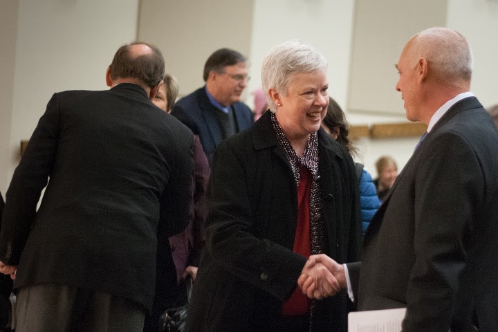 New president Kathleen Murray shakes hand with the Chair of the Board of Trustees Brad McMurchie at her announcement earlier today. Photo by Marcovici