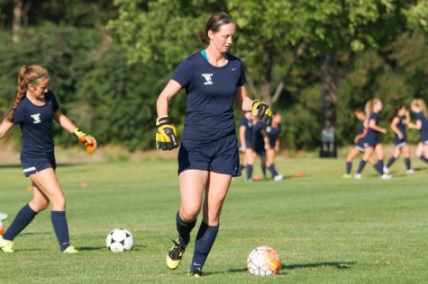 Senior Haley Case practices drills with her fellow goal keepers. 