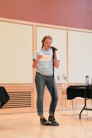 Sophomore Liza Brody addresses the volunteers before dispersing to their service projects. 