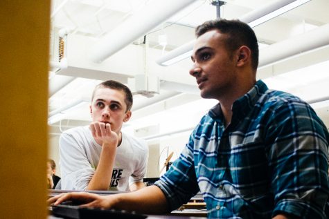 Students in science lab. Photo by James Baker.