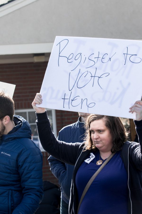 A voter registration table was set before and after the march.