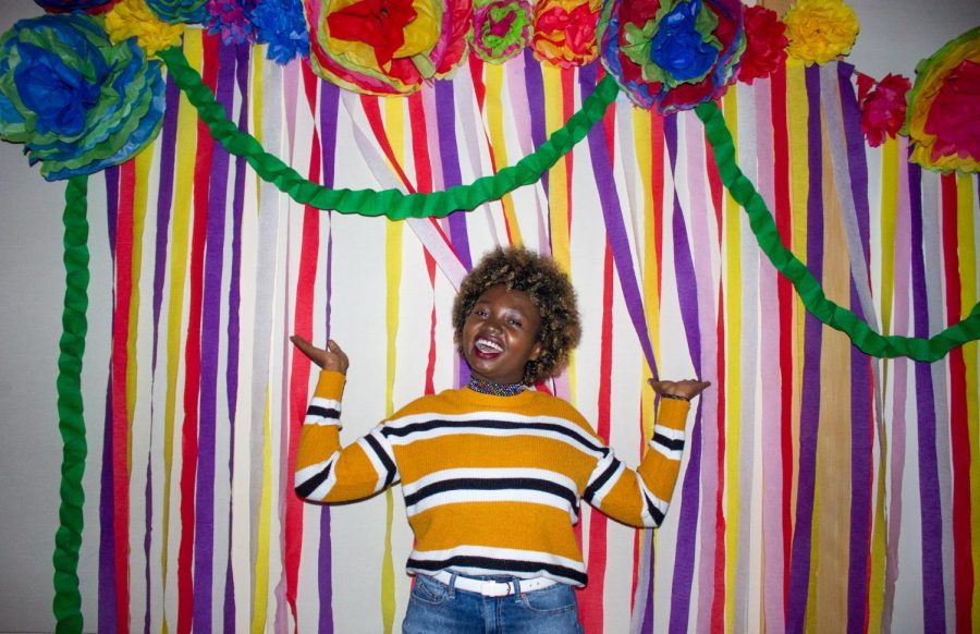 Sophomore Sylvia Adome poses at the events photo booth