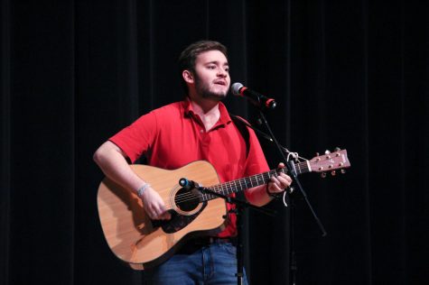 Senior contestant Stuart Ashford sings for the audience at Mx. Whitman. 