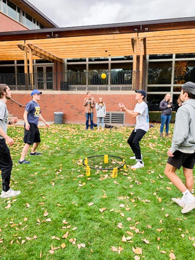 Students and parents enjoy a friendly, competitive game of spikeball during Family Weekend. Photos contributed by Peter Fitch