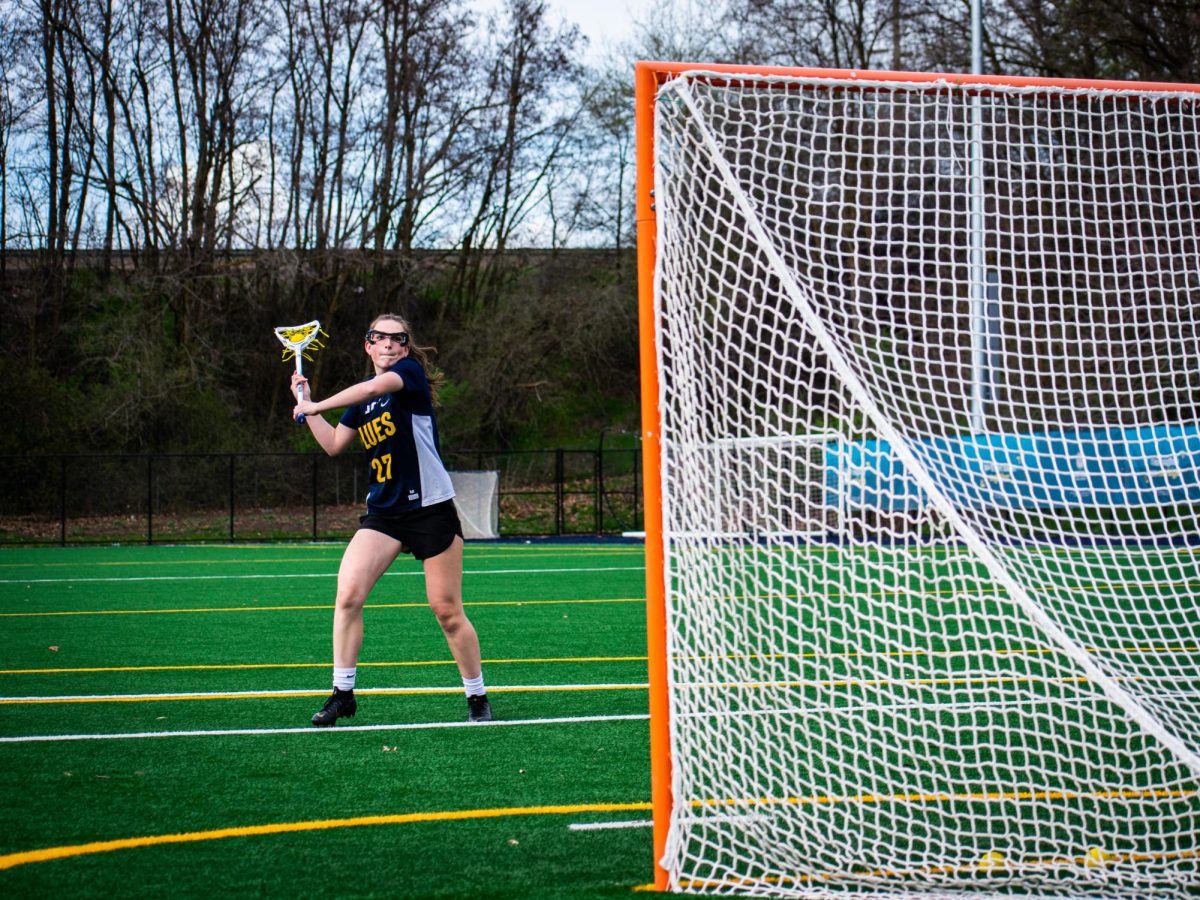 Teagan Huff aims for the goal during practice at Hayner Field. 